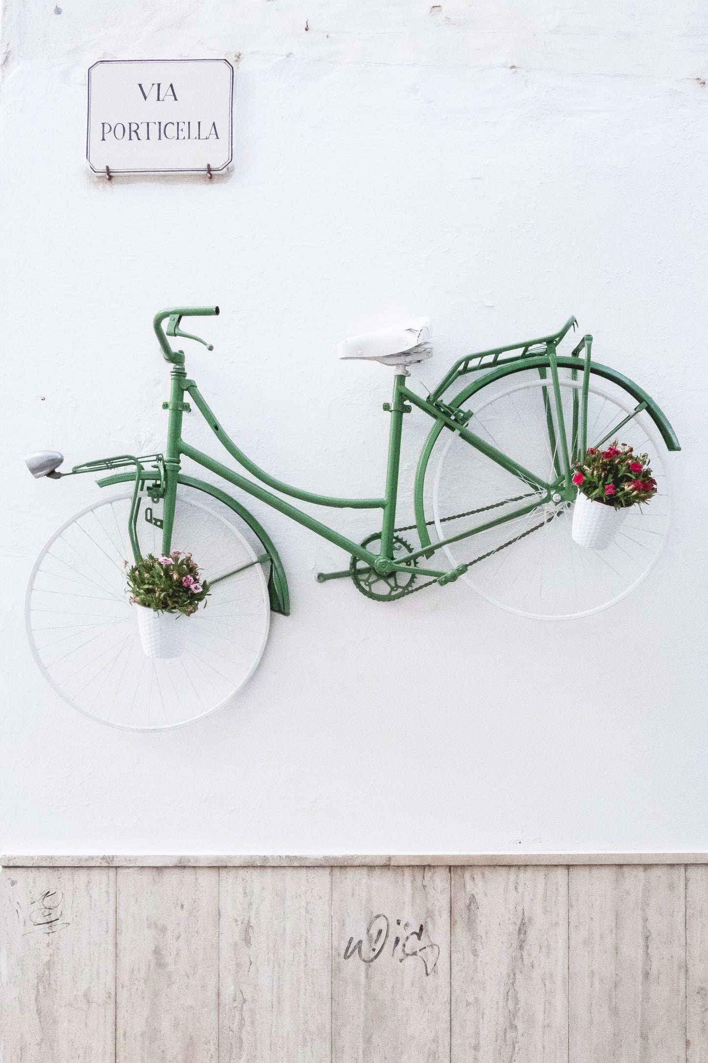 Green bicycle on the wall, Ceglie Messapica - Fine Art photography
